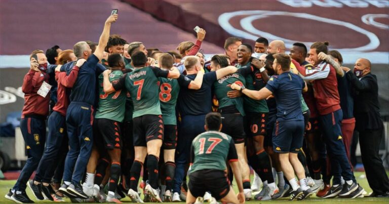 Aston Villa team celebrate survival