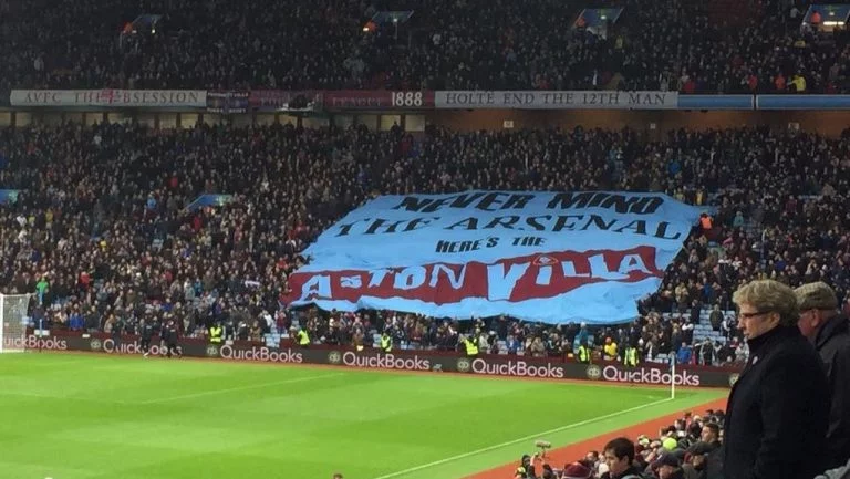 never mind the arsenal here's the aston villa surfer flag on holte end